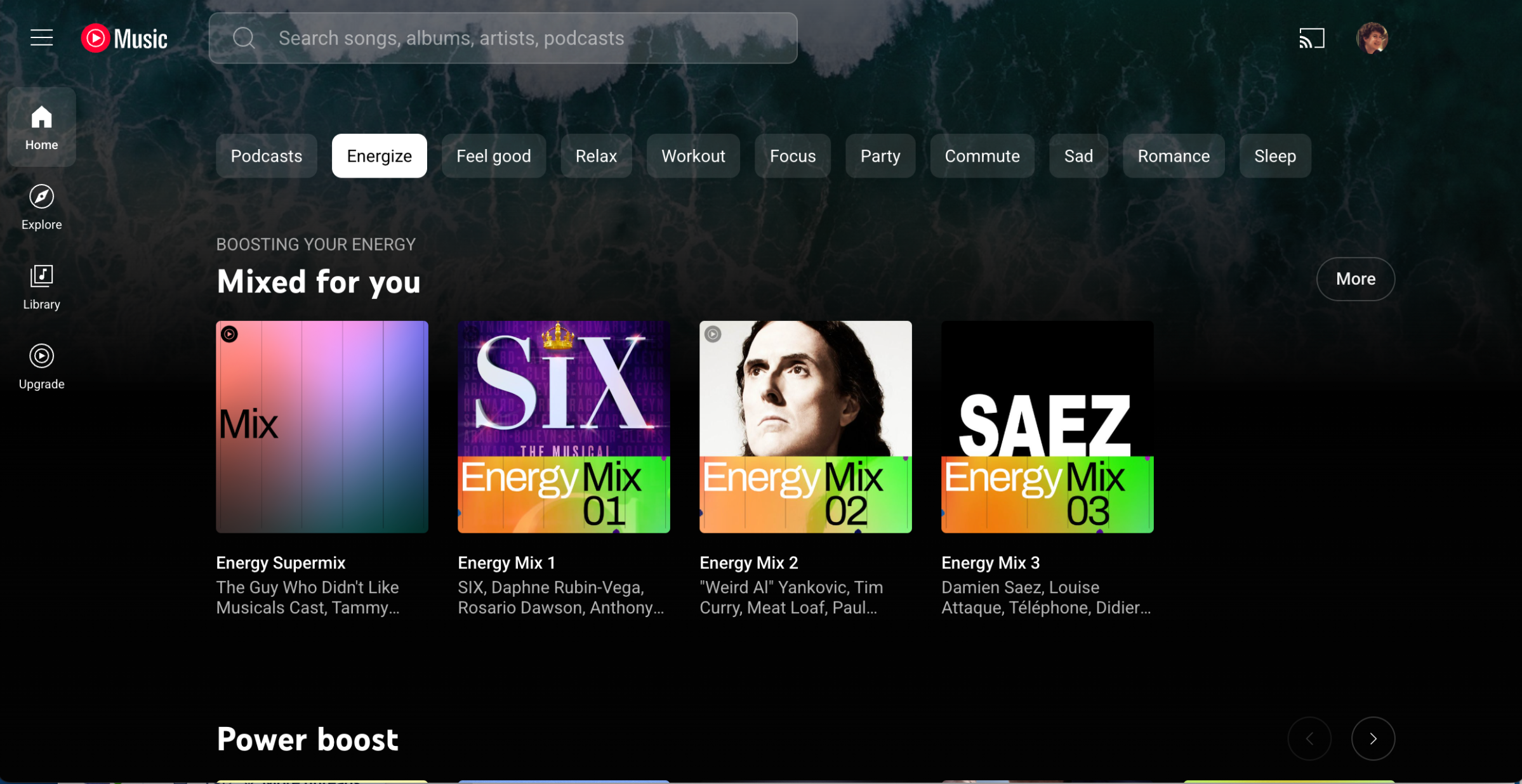 YouTube Music front page with categories of music across the top and several types of music illustrations under Mixed for you subhead.